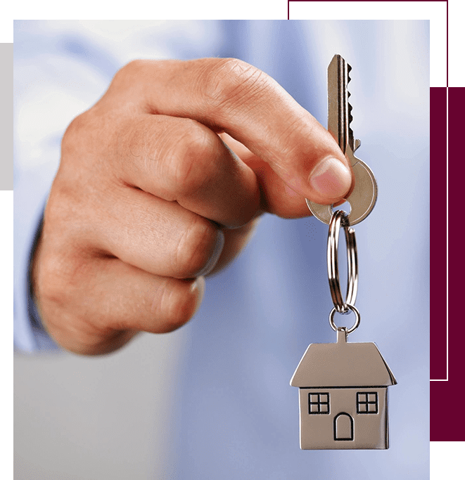 Magnum Asset International Network A person holding keys to a house
